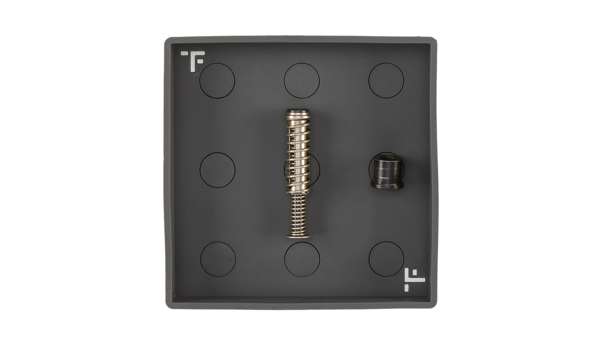 Tactical Formulary Mag Tray for organizing firearm magazines and small parts on a workbench